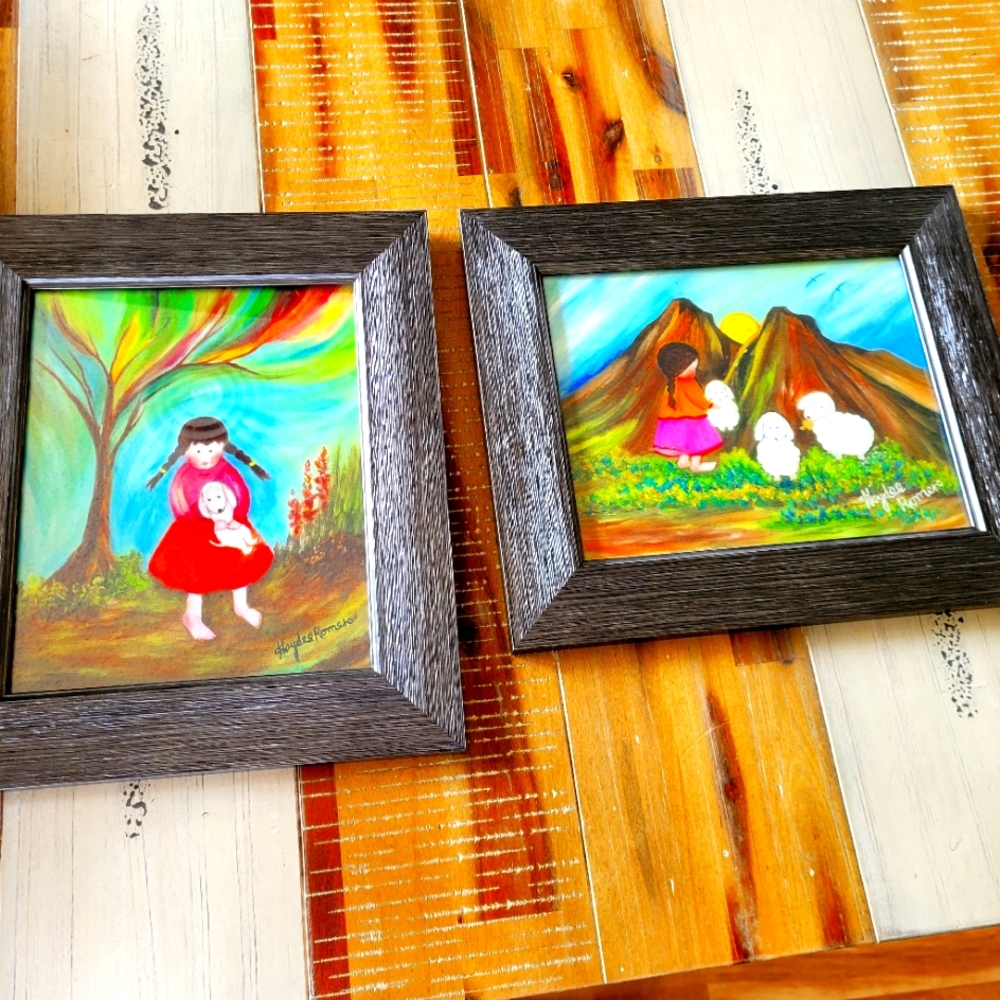 Two Haydee Romero Framed Prints